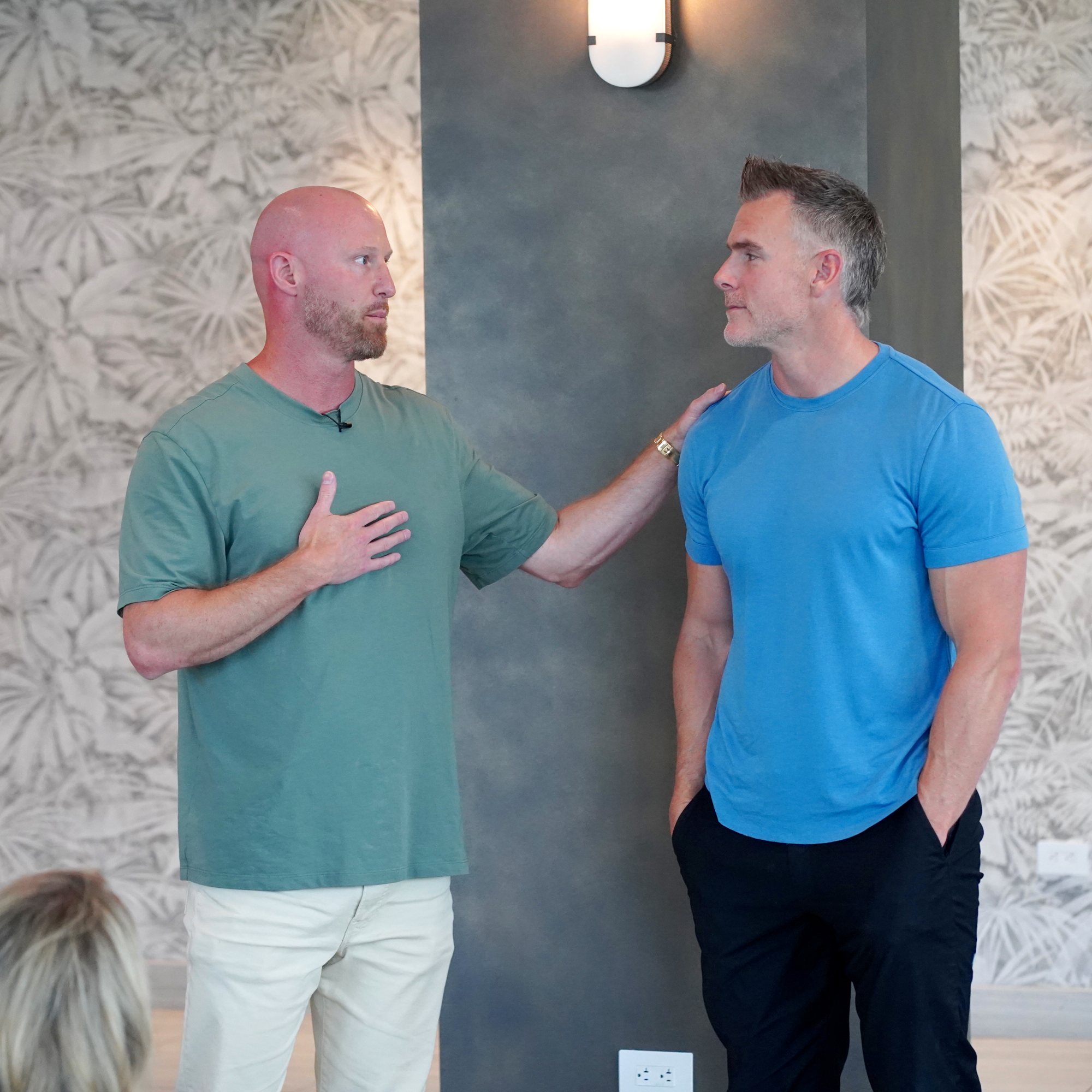 Two founders in close conversation